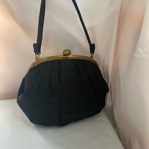 Chic Black Shoulder Bag with Gold Accents